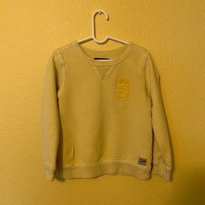 Yellow long sleeve shirt